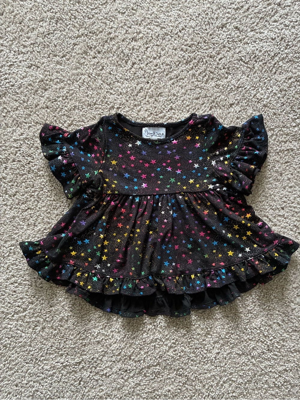 Pippa & Julie Black Top with Multicolor Glitter Stars and Ruffle Hem